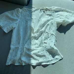 Blouse with golf polka dots